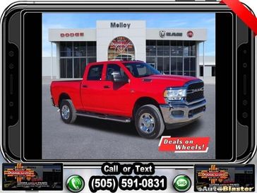 2024 RAM 3500 Tradesman Crew Cab 4x4 6'4' Box in a Flame Red Clear Coat exterior color and Blackinterior. Melloy Dodge RAM FIAT 505-588-4459 melloydodge.com 