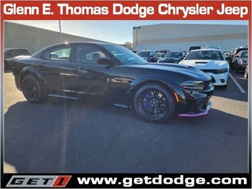 2023 Dodge Charger Scat Pack Widebody in a Pitch Black exterior color and Blackinterior. Glenn E Thomas 100 Years Of Excellence (866) 340-5075 getdodge.com 