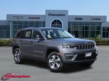 2024 Jeep Grand Cherokee 4xe in a Baltic Gray Metallic Clear Coat exterior color and CAPRI LEATHERETinterior. Champion Chrysler Jeep Dodge Ram 800-549-1084 pixelmotiondemo.com 