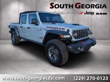 2024 Jeep Gladiator Mojave 4x4 in a Silver Zynith Clear Coat exterior color and Blackinterior. South Georgia CDJR 229-443-1466 southgeorgiacdjr.com 