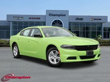 2023 Dodge Charger SXT Rwd in a Sublime exterior color and HOUNDSTOOTHinterior. Champion Chrysler Jeep Dodge Ram 800-549-1084 pixelmotiondemo.com 