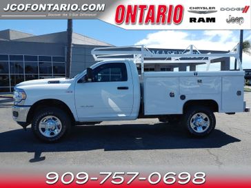 2022 RAM 2500 Tradesman in a Bright White Clear Coat exterior color and Diesel Gray/Blackinterior. Ontario Auto Center ontarioautocenter.com 
