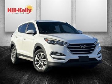 2018 Hyundai Tucson SEL in a Dazzling White exterior color and Grayinterior. Hill-Kelly Dodge (850) 786-2130 hillkellydodge.com 