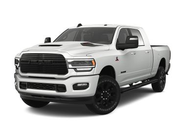 2024 RAM 2500 Laramie Mega Cab 4x4 6'4' Box in a Bright White Clear Coat exterior color. Wilmington Auto Center Chrysler Dodge Jeep Ram (937) 556-6430 wilmingtonautocentercdjr.com 