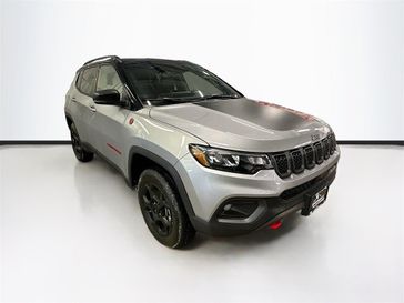 2024 Jeep Compass Trailhawk 4x4 in a Black Clear Coat exterior color and Ruby Red/Blackinterior. Sheridan Motors CDJR 307-218-2217 sheridanmotor.com 