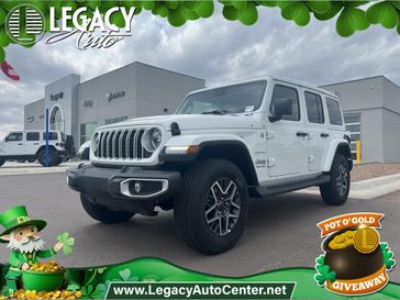 2024 Jeep Wrangler 4-door Sahara in a Bright White Clear Coat exterior color and Blackinterior. Legacy Auto Center 620-315-9264 legacyautocenter.net 