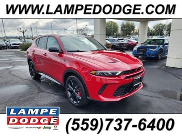 2024 Dodge Hornet R/T Plus Eawd in a Hot Tamale exterior color and Blackinterior. Lampe Chrysler Dodge Jeep RAM 559-471-3085 pixelmotiondemo.com 