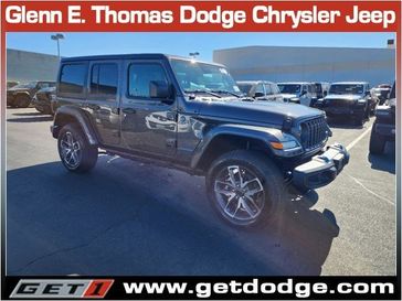 2024 Jeep Wrangler 4-door Sport S 4xe in a Granite Crystal Metallic Clear Coat exterior color and Blackinterior. Glenn E Thomas 100 Years Of Excellence (866) 340-5075 getdodge.com 
