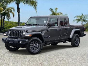 New 2026 Jeep Gladiator Sport S 4x4 in a Granite Crystal Metallic Clear Coat exterior color and Blackinterior. Southbay Chrysler Jeep Dodge Ram (424) 404-5521 pixelmotiondemo.com 