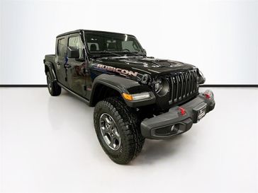 2023 Jeep Gladiator Rubicon 4x4 in a Black Clear Coat exterior color and Blackinterior. Sheridan Motors CDJR 307-218-2217 sheridanmotor.com 