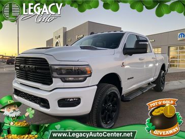 2024 RAM 2500 Laramie Crew Cab 4x4 6'4' Box in a Bright White Clear Coat exterior color and Blackinterior. Legacy Auto Center 620-315-9264 legacyautocenter.net 