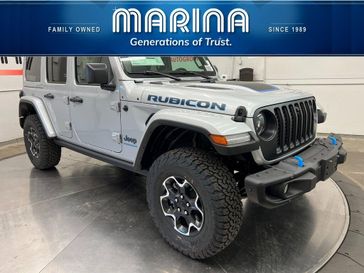 2023 Jeep Wrangler Rubicon 4xe in a Silver Zynith Clear Coat exterior color and Blackinterior. Marina Chrysler Dodge Jeep RAM (855) 616-8084 marinadodgeny.com 