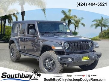 New 2026 Jeep Wrangler Willys in a Gray exterior color and Blackinterior. Southbay Chrysler Jeep Dodge Ram (424) 404-5521 pixelmotiondemo.com 