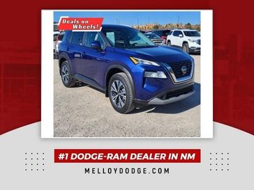 2022 Nissan Rogue SV in a Caspian Blue Metallic exterior color and Grayinterior. Melloy Dodge RAM FIAT 505-588-4459 melloydodge.com 