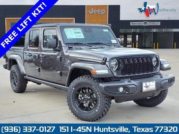 2024 Jeep Gladiator Willys 4x4 in a Granite Crystal Metallic Clear Coat exterior color. Wischnewsky Dodge 936-755-5310 wischnewskydodge.com 
