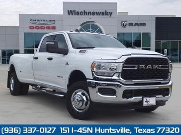 2024 RAM 3500 Lone Star Crew Cab 4x4 8' Box in a Bright White Clear Coat exterior color and Diesel Gray/Blackinterior. Wischnewsky Dodge 936-755-5310 wischnewskydodge.com 