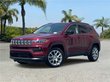 Used 2022 Jeep Compass Latitude Lux in a Velvet Red Pearl Coat exterior color and Blackinterior. Southbay Chrysler Jeep Dodge Ram (424) 404-5521 pixelmotiondemo.com 