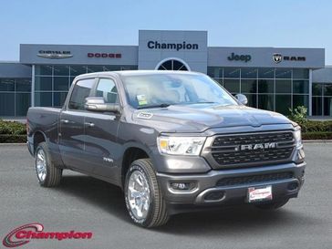 2024 RAM 1500 Big Horn Crew Cab 4x4 6'4' Box in a Granite Crystal Metallic Clear Coat exterior color and DELUXE CLOTHinterior. Champion Chrysler Jeep Dodge Ram 800-549-1084 pixelmotiondemo.com 