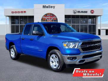 2024 RAM 1500 Big Horn Quad Cab 4x2 6'4' Box in a Hydro Blue Pearl Coat exterior color and Diesel Gray/Blackinterior. Melloy Dodge RAM FIAT 505-588-4459 melloydodge.com 