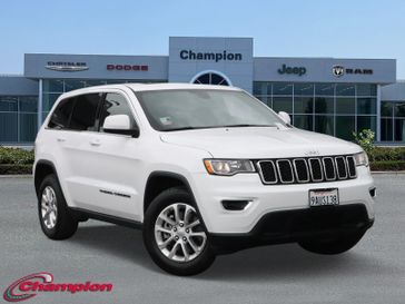 2022 Jeep Grand Cherokee WK Laredo X in a Bright White Clear Coat exterior color. Champion Chrysler Jeep Dodge Ram 800-549-1084 pixelmotiondemo.com 