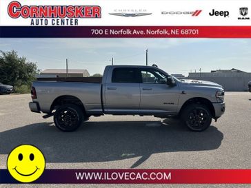 2024 RAM 2500 Laramie Crew Cab 4x4 6'4' Box in a Billet Silver Metallic Clear Coat exterior color and Blackinterior. Cornhusker Auto Center 402-866-8665 cornhuskerautocenter.com 