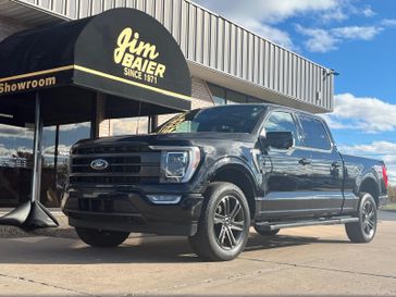 2021 Ford F-150 Lariat in a Agate Black Metallic exterior color and Blackinterior. Jim Baier Inc 319-372-1012 jimbaier.com 