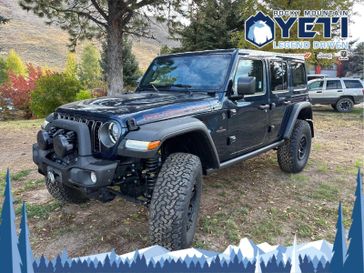 2025 Jeep Wrangler  in a PPS Fathom Blue Pearl Coat exterior color and VLX9interior. Rocky Mountain Yeti Jackson Hole 307-733-5337 rockymountainyetijacksonhole.com 