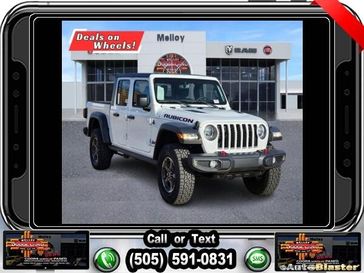 2022 Jeep Gladiator Rubicon in a Bright White Clear Coat exterior color and Blackinterior. Melloy Dodge RAM FIAT 505-588-4459 melloydodge.com 