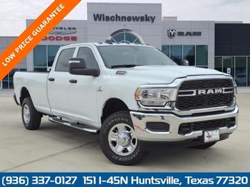 2024 RAM 2500 Tradesman Crew Cab 4x4 8' Box in a Bright White Clear Coat exterior color and Blackinterior. Wischnewsky Dodge 936-755-5310 wischnewskydodge.com 