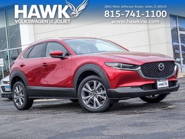 2021 Mazda CX-30 Premium in a Soul Red Crystal Metallic exterior color and Blackinterior. Glenview Luxury Imports 847-904-1233 glenviewluxuryimports.com 