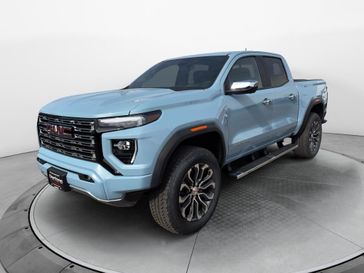 New 2026 GMC Canyon 4WD Denali in a Glacier Metallic exterior color and Jet Black/Teakinterior. Perkins La Junta 719-383-2250 perkinslajunta.com 