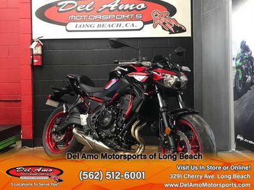 2024 Kawasaki ER650NRFAL-RD1  in a CANDY PERSIMMON RED/EBONY exterior color. Del Amo Motorsports of Long Beach (562) 362-3160 delamomotorsports.com 