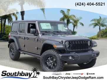 New 2026 Jeep Wrangler Willys in a Gray exterior color and Blackinterior. Southbay Chrysler Jeep Dodge Ram (424) 404-5521 pixelmotiondemo.com 