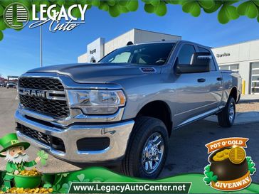 2024 RAM 2500 Tradesman Crew Cab 4x4 6'4' Box in a Billet Silver Metallic Clear Coat exterior color and Blackinterior. Legacy Auto Center 620-315-9264 legacyautocenter.net 