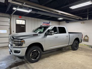 New 2026 RAM 3500 Laramie Crew Cab 4x4 6'4' Box in a Silver-Zynith exterior color and Blackinterior. Jensen Chrysler Dodge Jeep Ram 507-354-0542 jensenchryslerdodgejeepram.com 