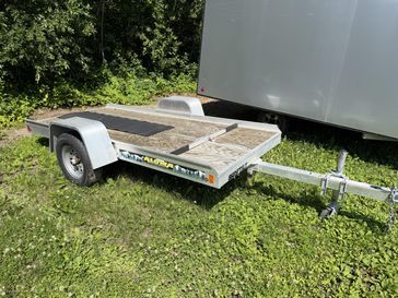 Used 2021 Aluma open utility single place snowmobile trailer 