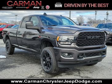 2024 RAM 3500 Big Horn Crew Cab 4x4 8' Box in a Granite Crystal Metallic Clear Coat exterior color and Blackinterior. Carman Chrysler Jeep Dodge Ram 302-317-2378 carmanchryslerjeepdodge.com 