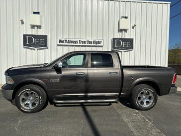 2014 RAM 1500 Laramie in a Deep Cherry Red Crystal Pearl Coat exterior color and Blackinterior. Dee Motor Company 406-563-5225 deemotors.com 