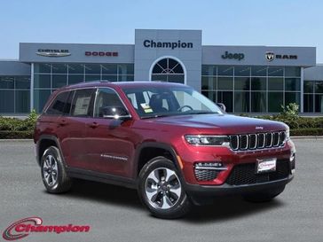 2024 Jeep Grand Cherokee 4xe in a Velvet Red Pearl Coat exterior color and CAPRI LEATHEREinterior. Champion Chrysler Jeep Dodge Ram 800-549-1084 pixelmotiondemo.com 