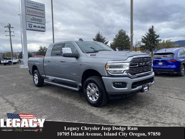 2024 RAM 3500 Laramie Mega Cab 4x4 6'4' Box in a Billet Silver Metallic Clear Coat exterior color. Legacy Chrysler Jeep Dodge RAM 541-663-4885 legacychryslerjeepdodgeram.com 