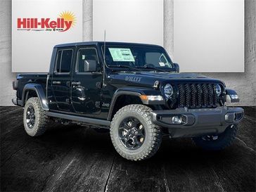 2023 Jeep Gladiator Willys 4x4 in a Black Clear Coat exterior color and Blackinterior. Hill-Kelly Dodge (850) 786-2130 hillkellydodge.com 