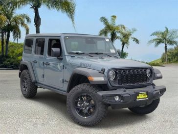 New 2026 Jeep Wrangler Willys in a Gray exterior color and Blackinterior. Southbay Chrysler Jeep Dodge Ram (424) 404-5521 pixelmotiondemo.com 