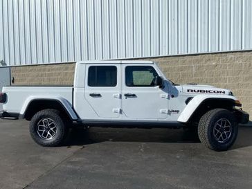 2024 Jeep Gladiator Rubicon X 4x4 in a Bright White Clear Coat exterior color and Blackinterior. Wilmington Auto Center Chrysler Dodge Jeep Ram (937) 556-6430 wilmingtonautocentercdjr.com 