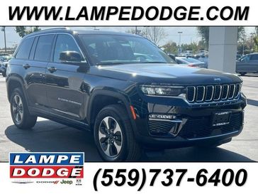 2023 Jeep Grand Cherokee 4xe in a Diamond Black Crystal Pearl Coat exterior color. Lampe Chrysler Dodge Jeep RAM 559-471-3085 pixelmotiondemo.com 