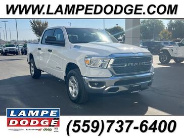 2024 RAM 1500 Big Horn Crew Cab 4x4 5'7' Box in a Bright White Clear Coat exterior color and Diesel Gray/Blackinterior. Lampe Chrysler Dodge Jeep RAM 559-471-3085 pixelmotiondemo.com 