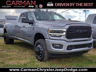 2024 RAM 3500 Laramie Crew Cab 4x4 8' Box in a Billet Silver Metallic Clear Coat exterior color and Black - GJX9interior. Carman Chrysler Jeep Dodge Ram 302-317-2378 carmanchryslerjeepdodge.com 