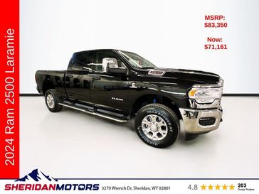 2024 RAM 2500 Laramie Crew Cab 4x4 6'4' Box in a Diamond Black Crystal Pearl Coat exterior color and Blackinterior. Sheridan Motors Auto (307) 218-2217 sheridanmotors.com 