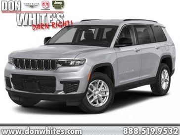 2024 Jeep Grand Cherokee L Limited in a Midnight Sky exterior color. Don White's Timonium Chrysler Dodge Jeep Ram 410-881-5409 donwhites.com 