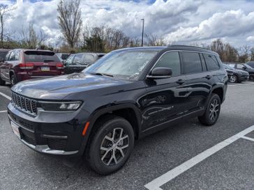 2024 Jeep Grand Cherokee L Limited in a Midnight Sky exterior color. Don White's Timonium Chrysler Dodge Jeep Ram 410-881-5409 donwhites.com 