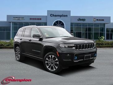 2023 Jeep Grand Cherokee Overland 4xe in a Diamond Black Crystal Pearl Coat exterior color and NAPPA LTHRinterior. Champion Chrysler Jeep Dodge Ram 800-549-1084 pixelmotiondemo.com 